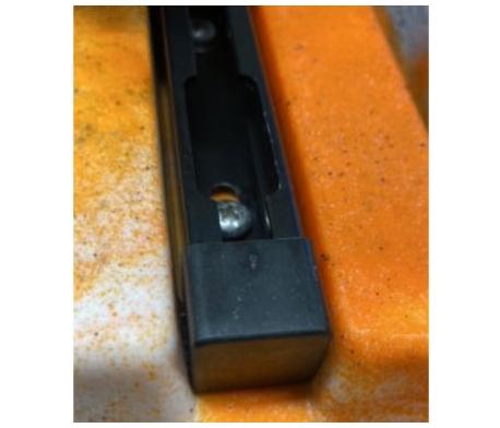 Bouchon d'extrémité de rail d'accessoire